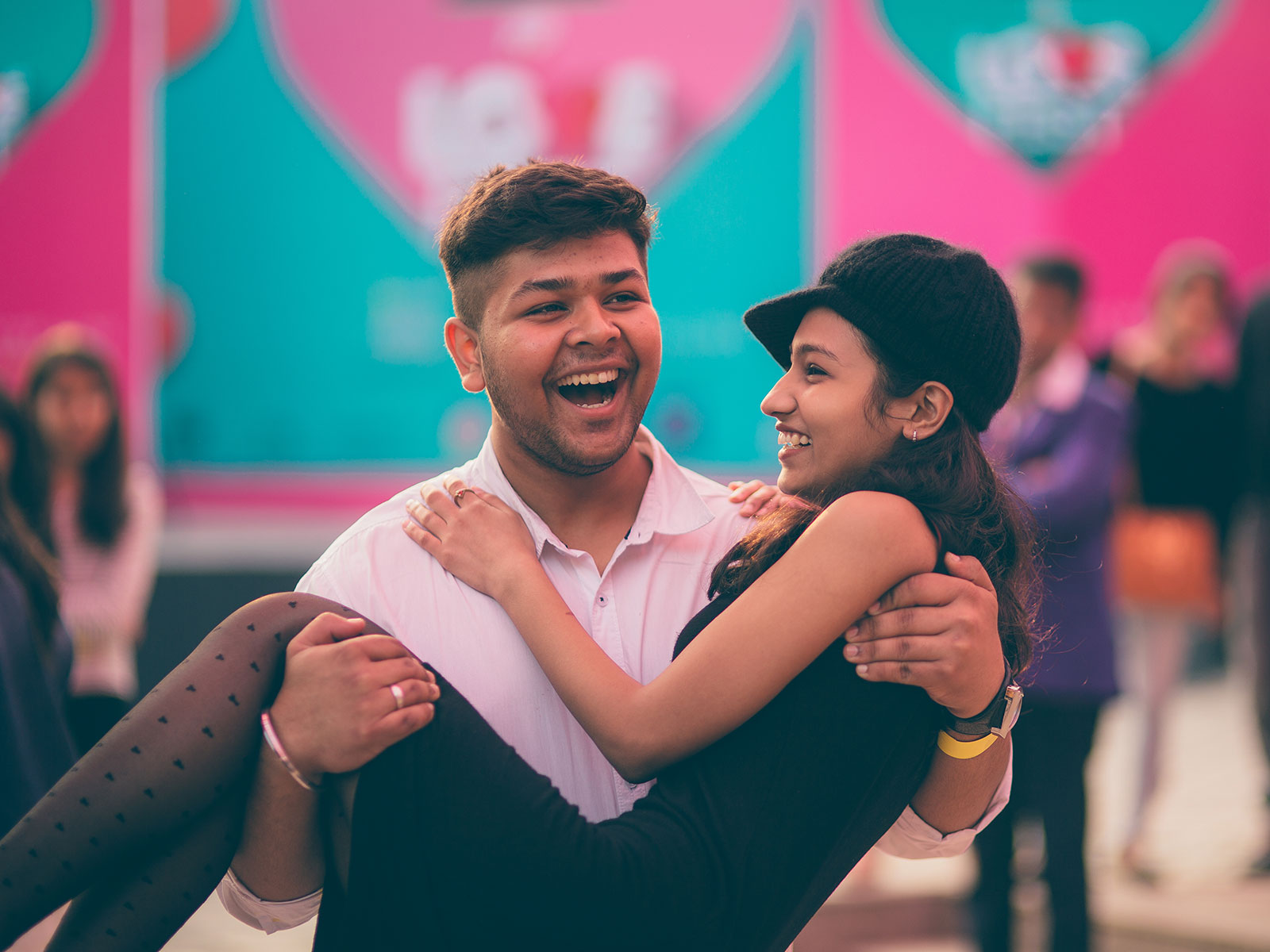 A couple gets candid at the POPxo Love Fest held at One Golden Mile in Delhi